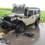 demolierter heller jeep